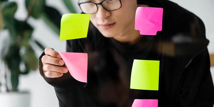 peeling sticky notes off window