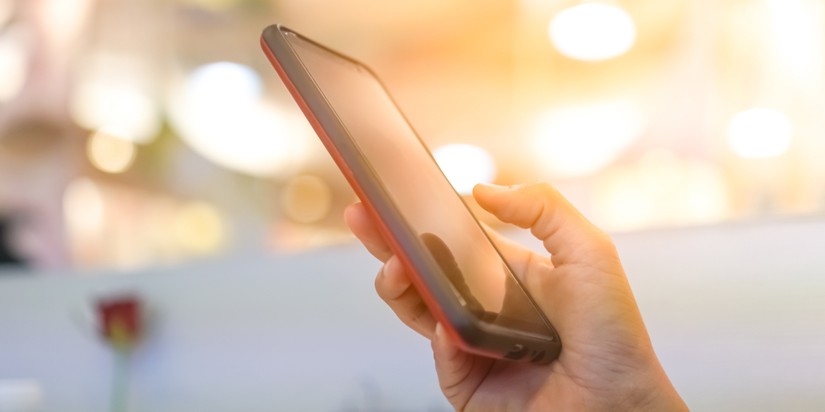 Person holding a phone in their hand