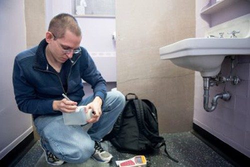 Student testing Flint tap water