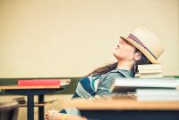 woman sleeping in a chair