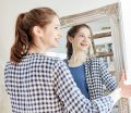 girl holding mirror