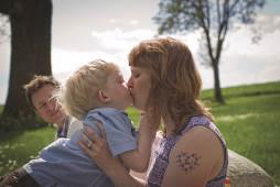 Jonah Weishaar, who has Sanfilippo syndrome, type C, with his mother.