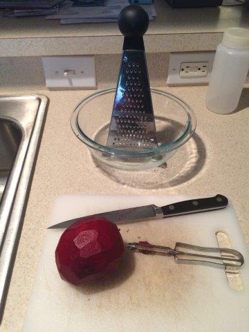 Beets used in cooking contain proteins near a kitchen sink.