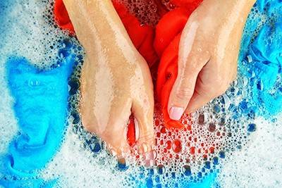 Hand washing fabrics reduces microplastic release compared with machine  washing - American Chemical Society